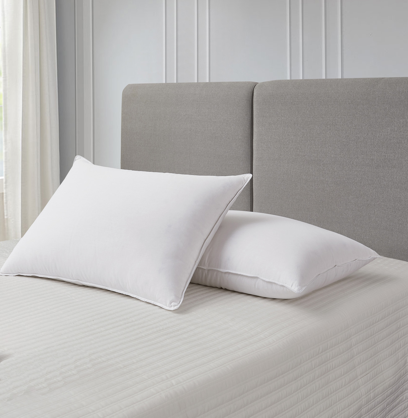 micro denier down alternative pillow on bed